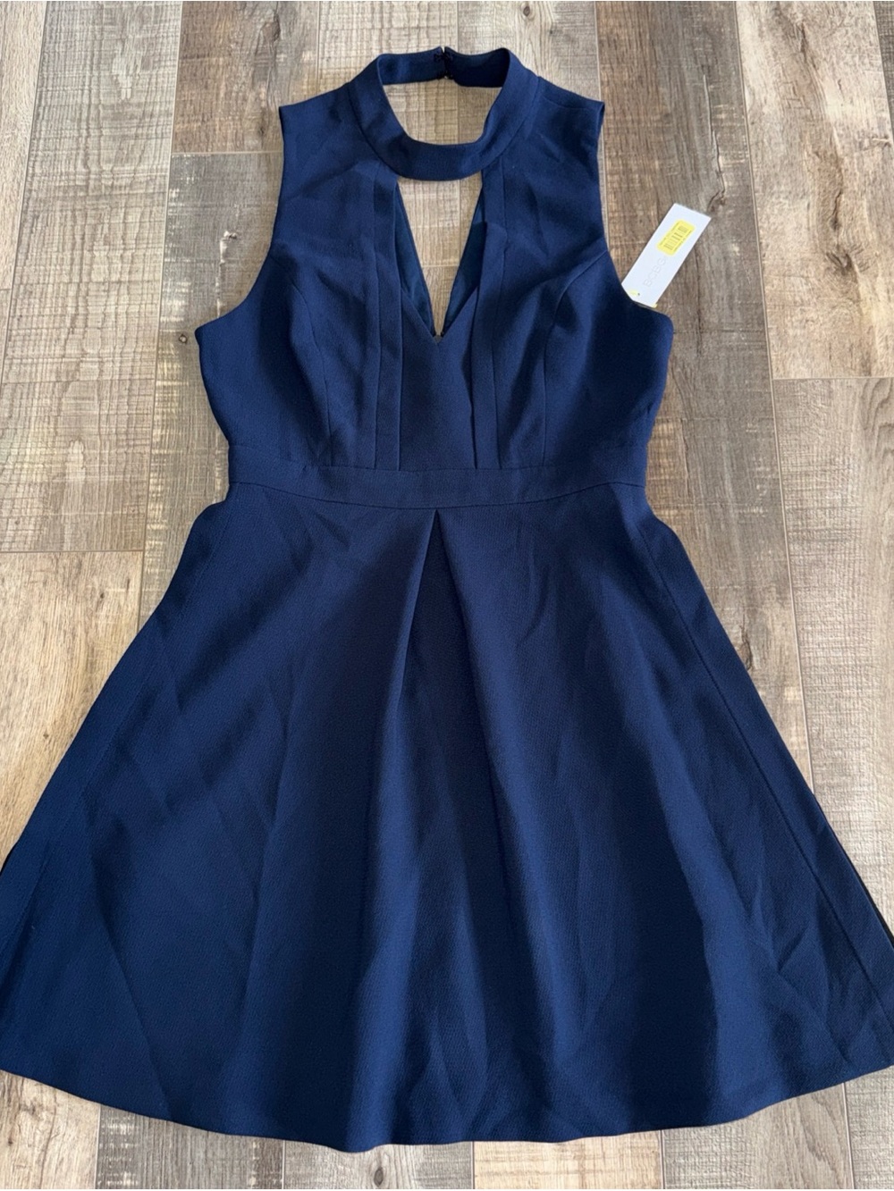 BCBG size 4 Sleeveless Navy Fit-and-Flare Dress with Keyhole Neck